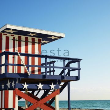 fototapet strandhus rött, vitt och blått av ESTAhome
